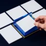 Human review of blank product-content tiles after an AI-assisted processing stage